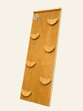 A 2-in-1 slide and wooden climbing wall with curved w-inooden handholds ramp.